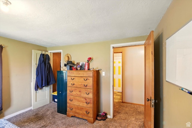 1411 E 13000 N, Cove, UT 84320 - carpeted bedroom with a textured ceiling and baseboards
