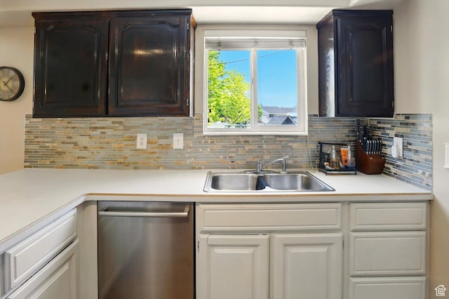 2223 S Allison Way, Syracuse, UT 84075 - kitchen featuring stainless steel dishwasher, a sink, light countertops, backsplash, and white cabinets