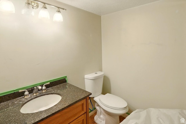 2223 S Allison Way, Syracuse, UT 84075 - half bath with toilet, vanity, and a textured ceiling