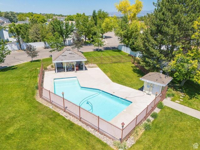 1127 W Monticello Ln, Murray, UT 84123 - view of pool featuring a storage structure, an outbuilding, and a patio area