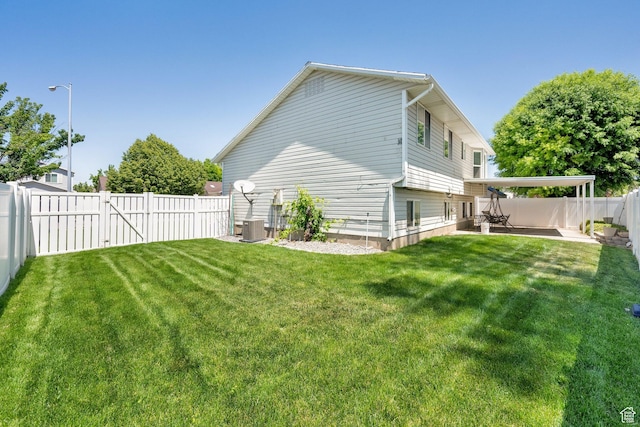 1127 W Monticello Ln, Murray, UT 84123 - view of yard featuring a patio and cooling unit