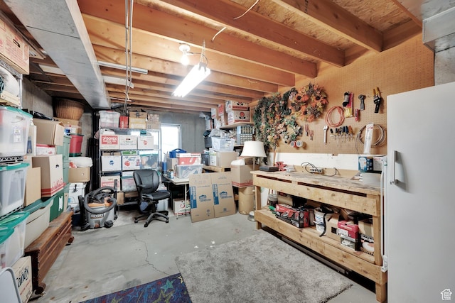 1127 W Monticello Ln, Murray, UT 84123 - basement with freestanding refrigerator and a workshop area