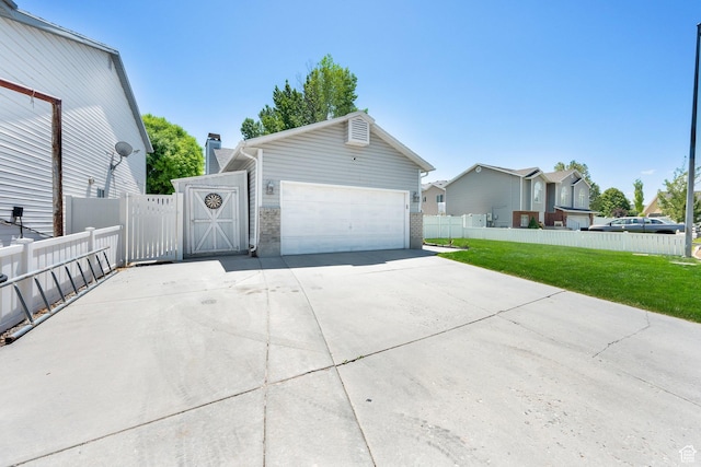 1127 W Monticello Ln, Murray, UT 84123 - view of side of property with concrete driveway, a gate, and a garage