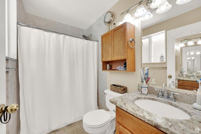 1127 W Monticello Ln, Murray, UT 84123 - full bathroom with vanity, toilet, curtained shower, and tile patterned flooring