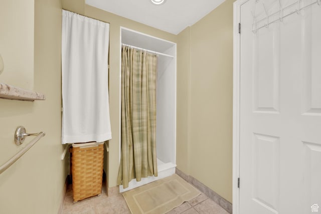 1127 W Monticello Ln, Murray, UT 84123 - bathroom with a shower with shower curtain and tile patterned flooring