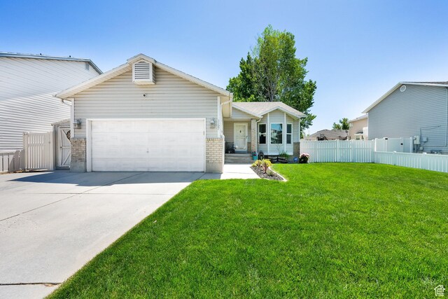 1127 W Monticello Ln, Murray, UT 84123 - single story home featuring brick siding, a garage, and concrete driveway