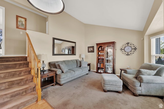 1127 W Monticello Ln, Murray, UT 84123 - living area featuring stairs, carpet, high vaulted ceiling, and baseboards