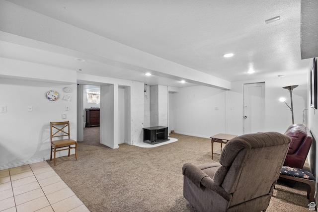 331 Beck St, Eureka, UT 84628 - tiled living room featuring a wood stove, carpet, baseboards, and recessed lighting