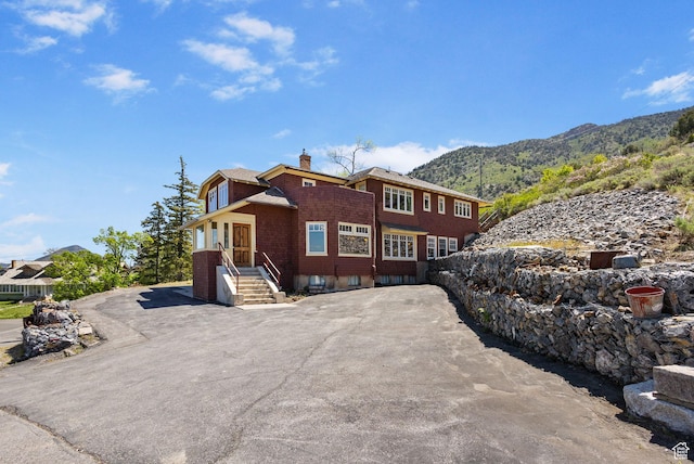 331 Beck St, Eureka, UT 84628 - view of property exterior featuring a mountain view and a chimney