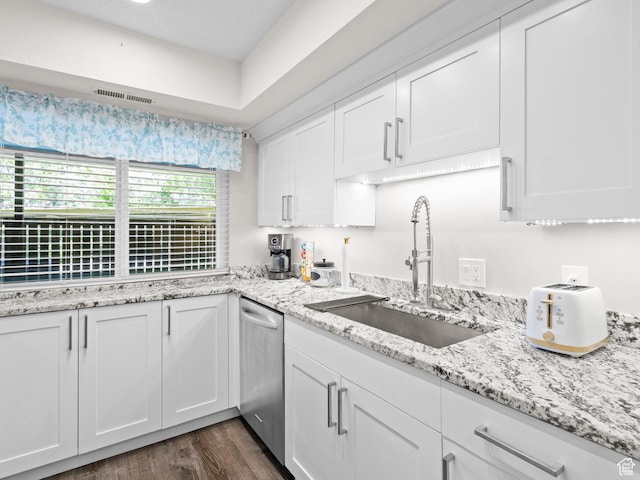 343 Peach Ln, Bountiful, UT 84010 - kitchen with a sink, stainless steel dishwasher, white cabinets, dark wood-style flooring, and light stone counters