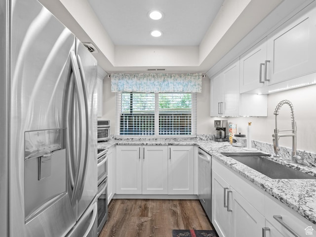 343 Peach Ln, Bountiful, UT 84010 - kitchen featuring stainless steel appliances, a sink, white cabinetry, dark wood-type flooring, and recessed lighting