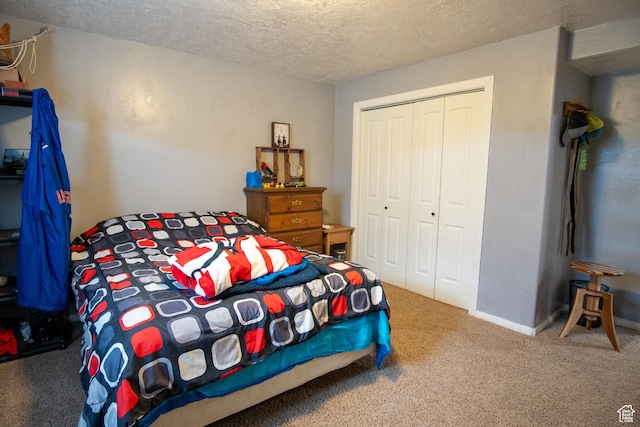 286 E 850 N, Richfield, UT 84701 - carpeted bedroom featuring a closet and a textured ceiling