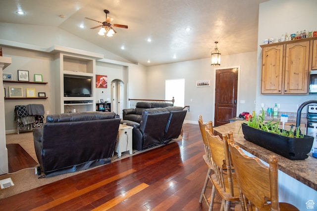 286 E 850 N, Richfield, UT 84701 - living room with arched walkways, a ceiling fan, dark wood-style flooring, vaulted ceiling, and recessed lighting