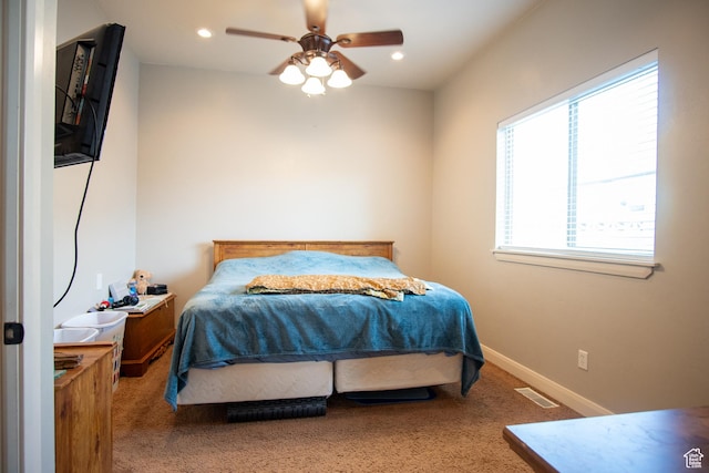 286 E 850 N, Richfield, UT 84701 - bedroom featuring multiple windows, carpet, recessed lighting, a ceiling fan, and baseboards