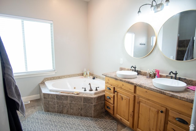 286 E 850 N, Richfield, UT 84701 - bathroom with double vanity, a whirlpool tub, and tile patterned floors