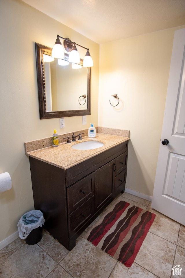 286 E 850 N, Richfield, UT 84701 - bathroom featuring vanity, baseboards, and tile patterned floors