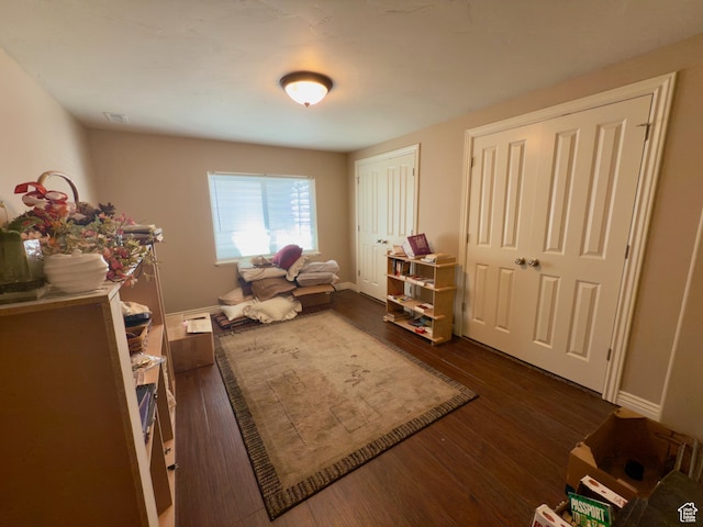 3322 N 750 E, Lehi, UT 84043 - living area featuring dark wood-style floors and baseboards