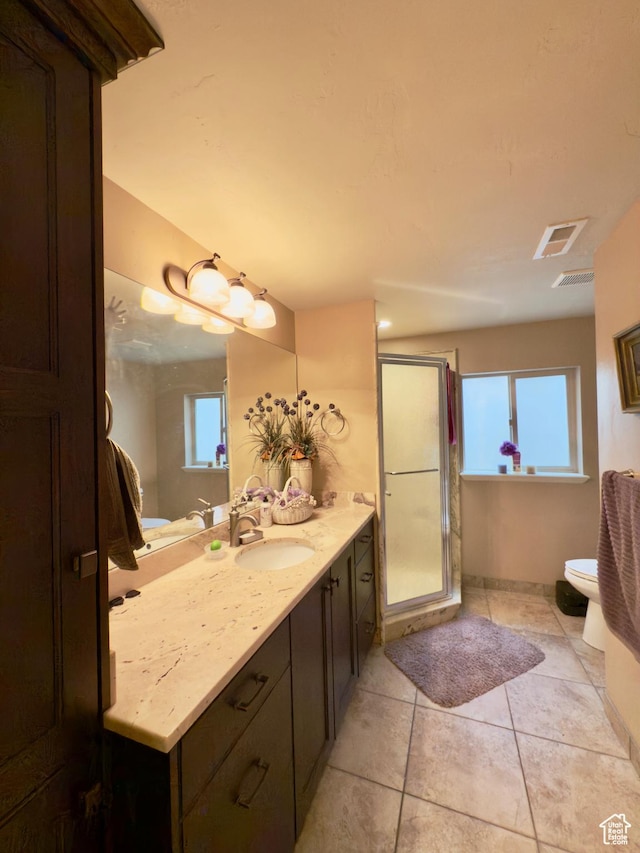 3322 N 750 E, Lehi, UT 84043 - full bathroom with vanity, a shower stall, toilet, tile patterned floors, and baseboards