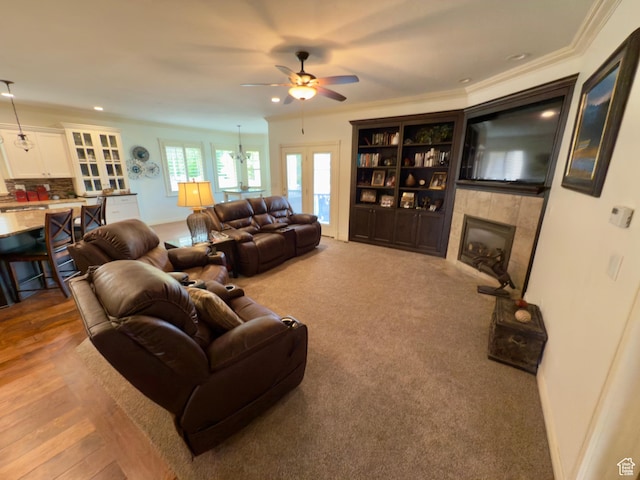 3322 N 750 E, Lehi, UT 84043 - living room with ceiling fan, a tile fireplace, recessed lighting, ornamental molding, and baseboards