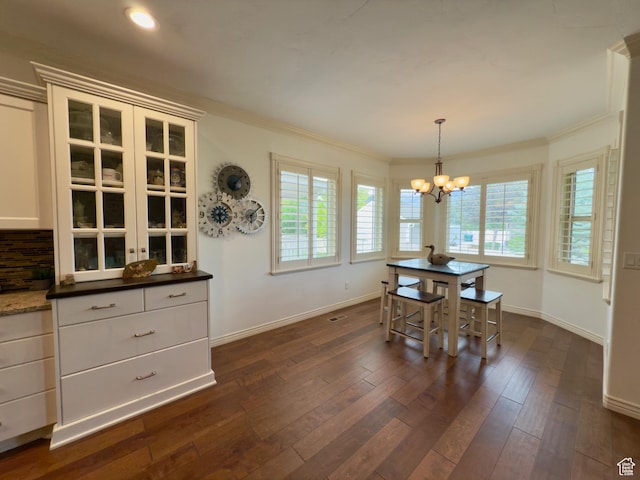 3322 N 750 E, Lehi, UT 84043 - dining area with a chandelier, healthy amount of natural light, baseboards, dark wood finished floors, and ornamental molding