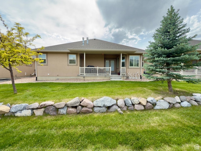 3322 N 750 E, Lehi, UT 84043 - rear view of house featuring covered porch, stucco siding, and roof with shingles