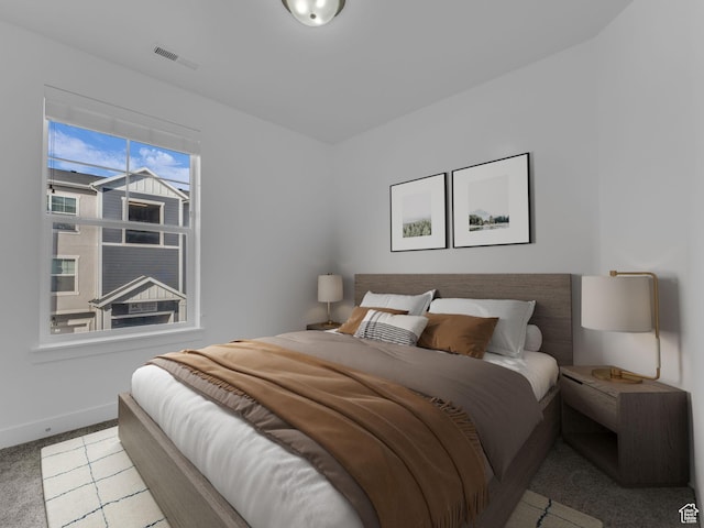 14569 S Bloom Dr W Unit L204, Herriman, UT 84096 - carpeted bedroom featuring baseboards