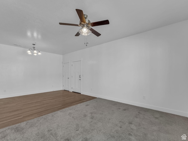 14569 S Bloom Dr W Unit L204, Herriman, UT 84096 - carpeted empty room with a ceiling fan, a chandelier, and baseboards