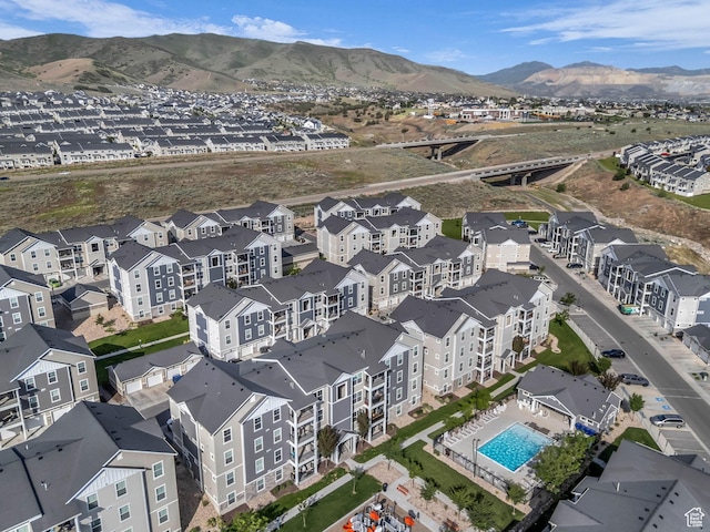 14569 S Bloom Dr W Unit L204, Herriman, UT 84096 - aerial view of property's location with a pool and a mountainous background