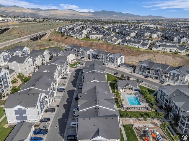 14569 S Bloom Dr W Unit L204, Herriman, UT 84096 - aerial perspective of suburban area featuring a pool area and a mountain backdrop