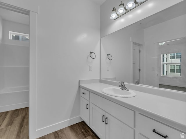 14569 S Bloom Dr W Unit L204, Herriman, UT 84096 - full bath with vanity, wood finished floors, and baseboards