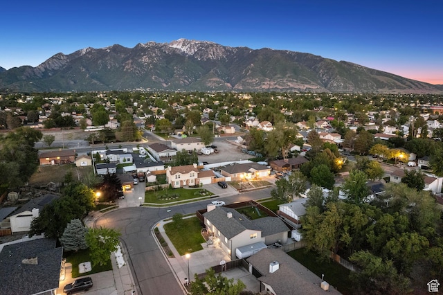 946 E 10715 S, Sandy, UT 84094 - aerial view of property and surrounding area featuring a mountain backdrop and nearby suburban area