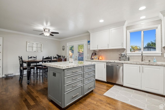 946 E 10715 S, Sandy, UT 84094 - kitchen featuring stainless steel dishwasher, gray cabinets, a sink, white cabinets, and a ceiling fan