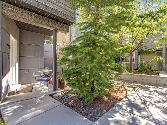 7701 S Navarro View Ct, Midvale, UT 84047 - property entrance with a patio area