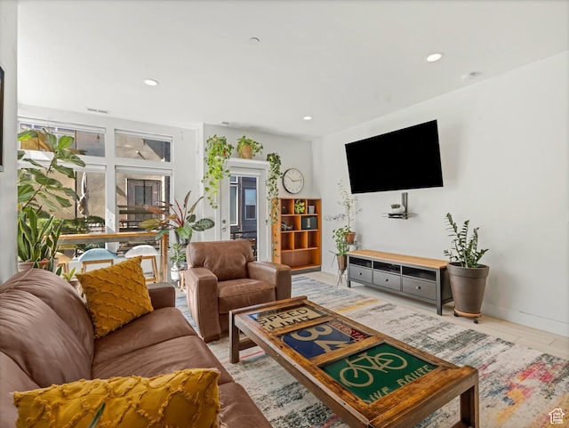 7701 S Navarro View Ct, Midvale, UT 84047 - living room featuring recessed lighting and light tile patterned floors