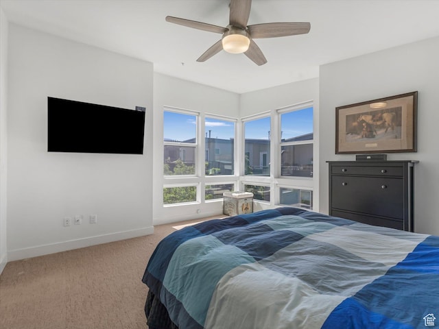 7701 S Navarro View Ct, Midvale, UT 84047 - bedroom featuring carpet, baseboards, and a ceiling fan