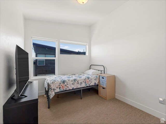 7701 S Navarro View Ct, Midvale, UT 84047 - carpeted bedroom featuring baseboards