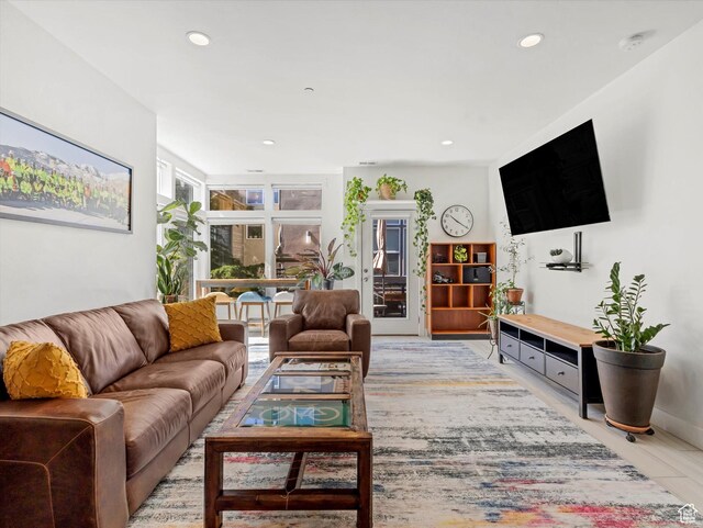 7701 S Navarro View Ct, Midvale, UT 84047 - living room featuring recessed lighting