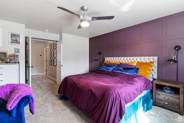 1064 W 2050 S, Syracuse, UT 84075 - bedroom featuring light carpet, ceiling fan, and a decorative wall