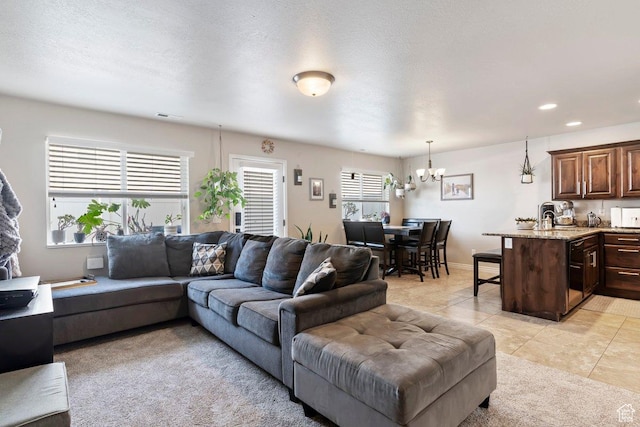 1064 W 2050 S, Syracuse, UT 84075 - living area with a chandelier, light tile patterned floors, and recessed lighting
