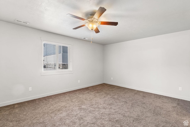 14394 S Oakfield Way, Herriman, UT 84096 - carpeted spare room featuring a ceiling fan and baseboards