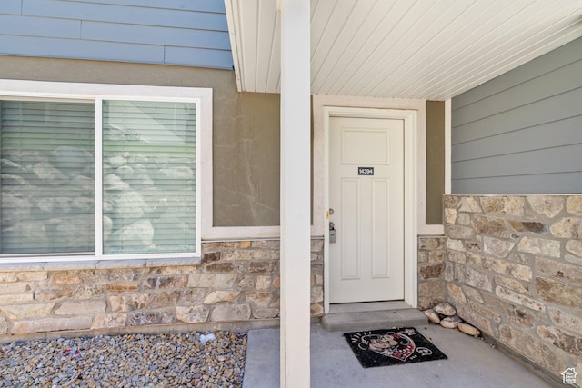 14394 S Oakfield Way, Herriman, UT 84096 - view of exterior entry featuring stone siding