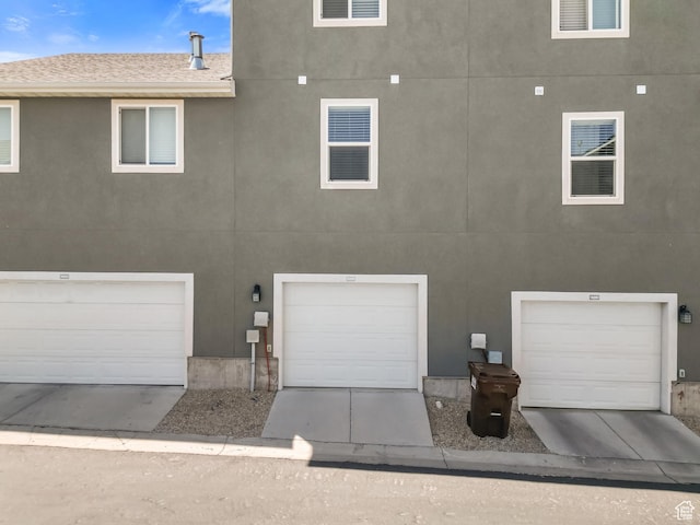 14383 S Firgrove Way Unit 0L-18, Herriman, UT 84096 - view of front of home with stucco siding