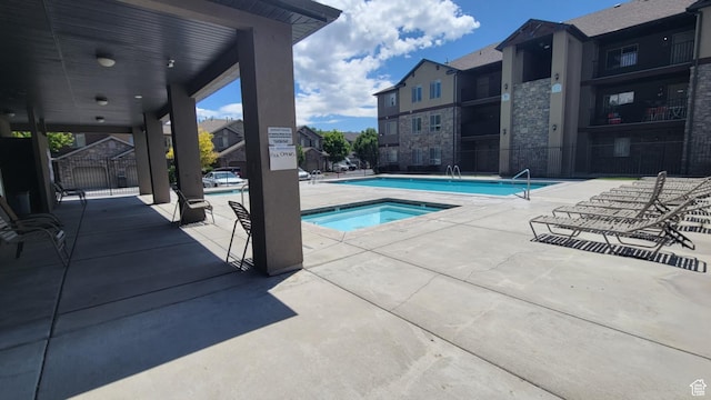 581 S 910 W Unit 86, Pleasant Grove, UT 84062 - community pool featuring a community hot tub and a patio