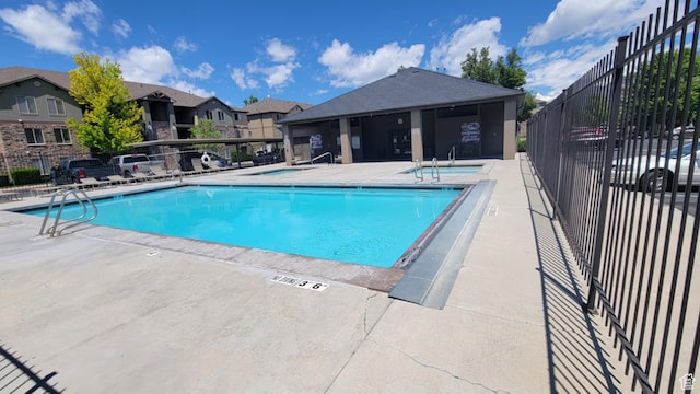 581 S 910 W Unit 86, Pleasant Grove, UT 84062 - community pool featuring a patio area and a residential view