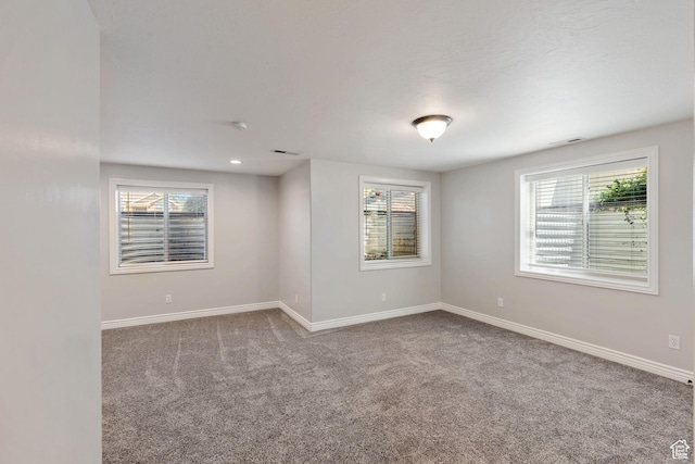 2167 W 2200 S, Syracuse, UT 84075 - carpeted empty room with healthy amount of natural light and baseboards