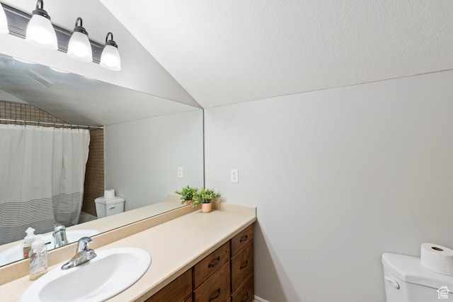 2167 W 2200 S, Syracuse, UT 84075 - full bathroom with toilet, vaulted ceiling, vanity, and curtained shower