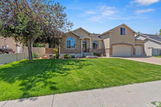 2167 W 2200 S, Syracuse, UT 84075 - view of front of house with stucco siding, driveway, an attached garage, and stone siding