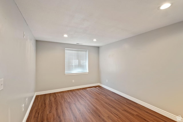 2167 W 2200 S, Syracuse, UT 84075 - empty room with baseboards, wood finished floors, and recessed lighting