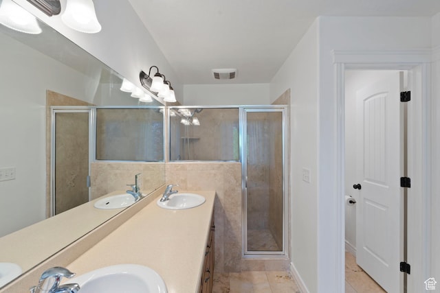 2167 W 2200 S, Syracuse, UT 84075 - bathroom with double vanity, a stall shower, and tile patterned floors