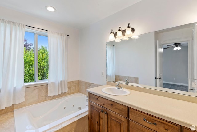 2167 W 2200 S, Syracuse, UT 84075 - bathroom with a whirlpool tub, vanity, and a ceiling fan